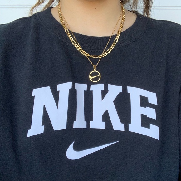 gold nike swoosh